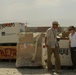 Joint senior logisticians walk disposition services yard in Bagram