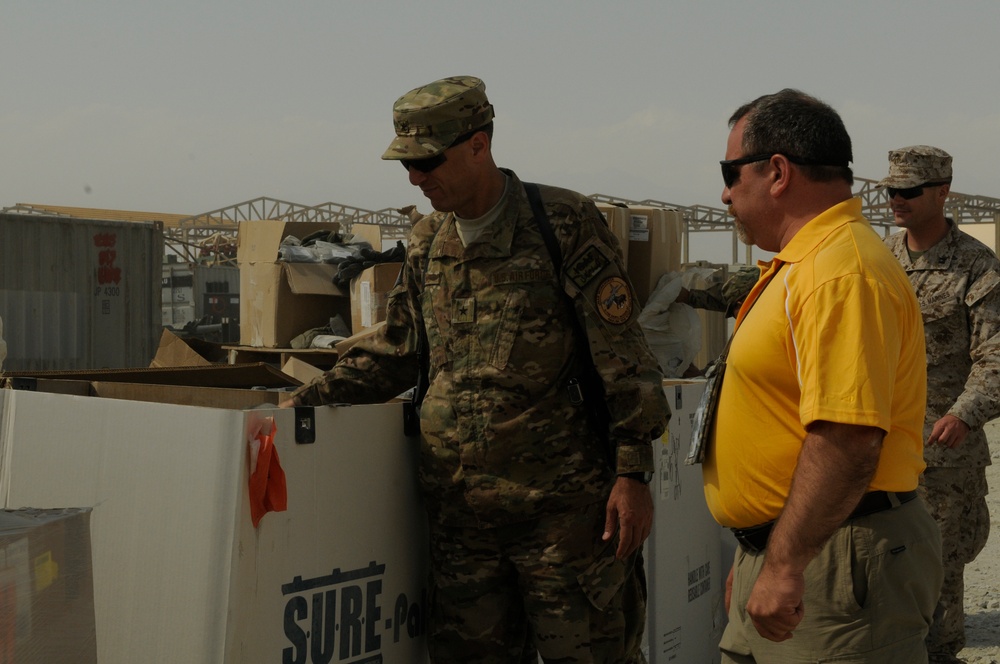 Joint senior logisticians walk disposition services yard in Bagram