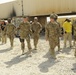 Joint senior logisticians walk disposition services yard in Bagram