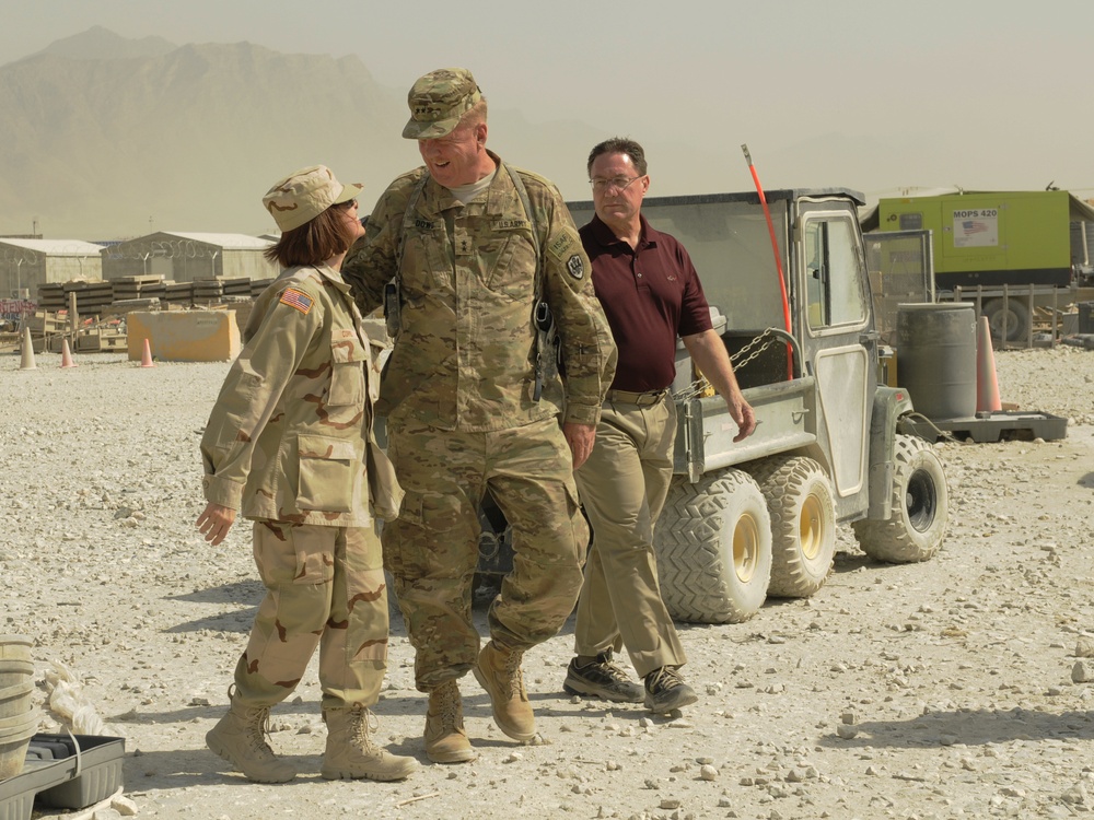 Joint senior logisticians walk disposition services yard in Bagram