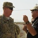 Joint senior logisticians walk disposition services yard in Bagram