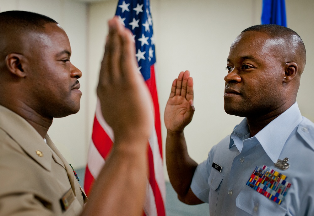 Identical twins complete long-awaited reenlistment