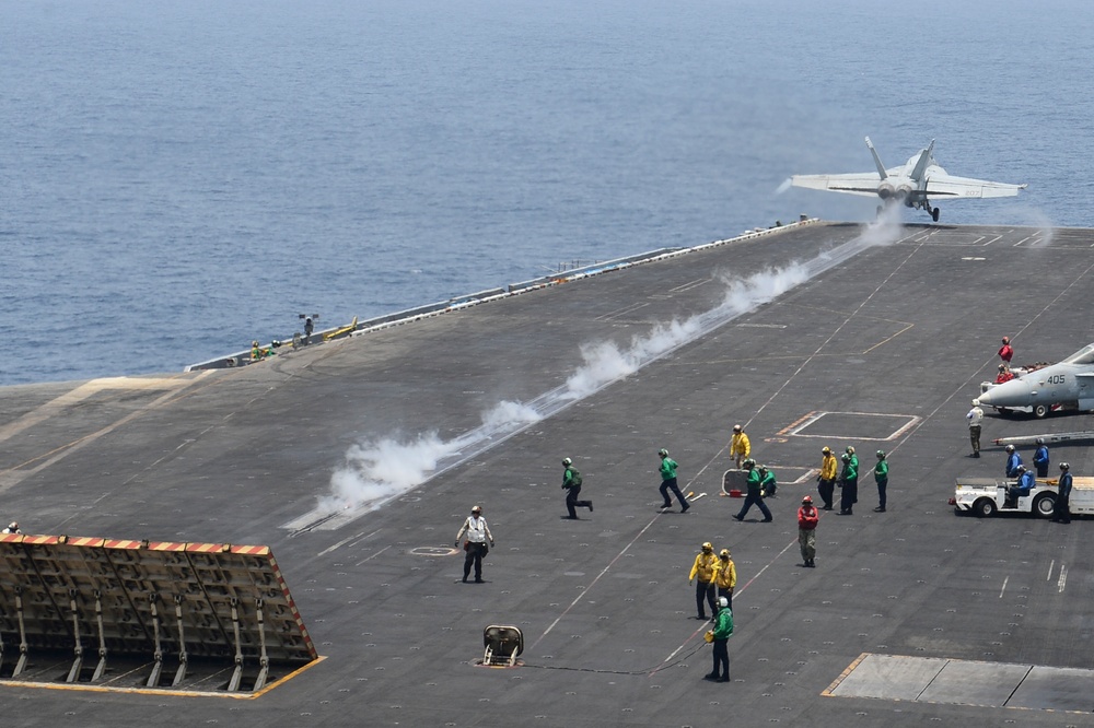 F/A-18E Super Hornet takes off from USS Nimitz