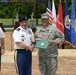 Capt. Bourne receives Distinguished Pistol Shot badge