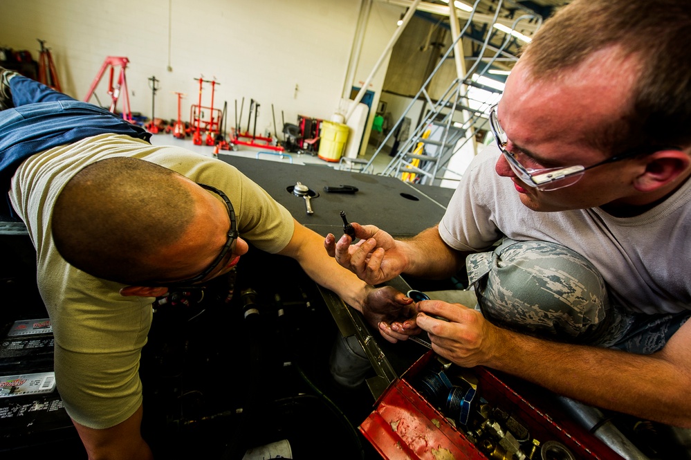 Vehicle maintainers keep wheels rolling