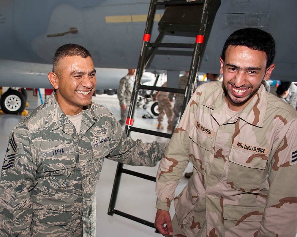 Chief Master Sgt. Gerardo Tapia talks with an airman from the Royal Saudi air force