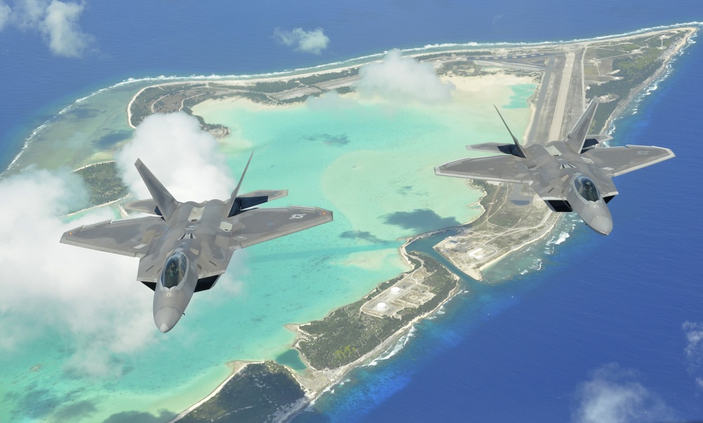 F-22 Raptors fly over Wake Island