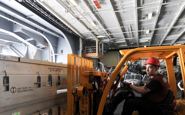 USS Nimitz sailors at work