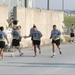 KFOR troops run with Roy