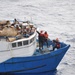 Rescuing and helping the stranded Haitian merchant vessel Hunter, June 13