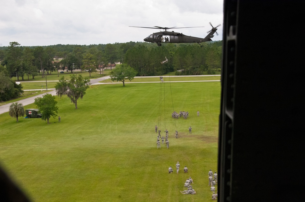 Air Assault students rappel from Black Hawk