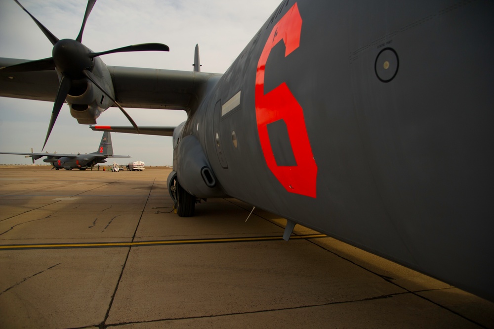 C-130s equipped with the Modular Airborne Fire Fighting System arrive in Mesa, Ariz.