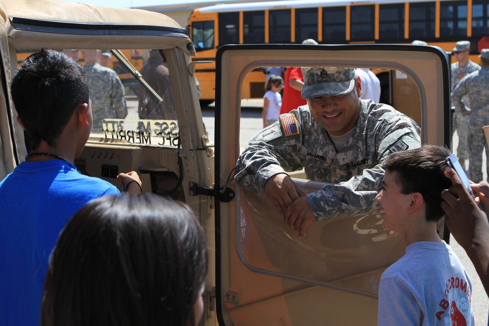 Soldiers talk with middle school students