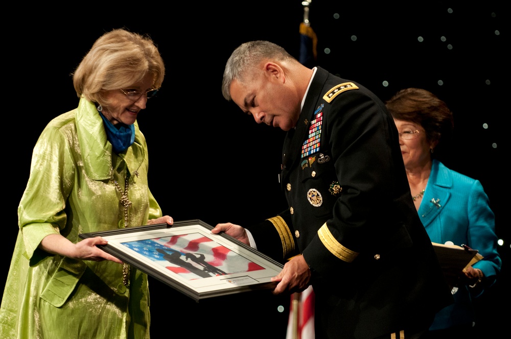 Gen. John F. Campbell, the vice chief of staff, US, receives a plaque at the Military Child Education Coalition 2013 National Training Seminar
