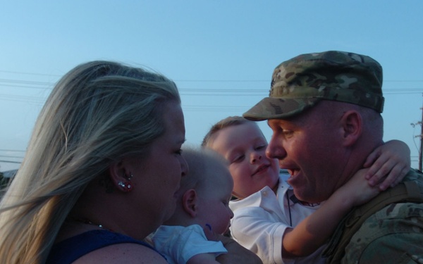 Long Knife soldier returns home to family, new son