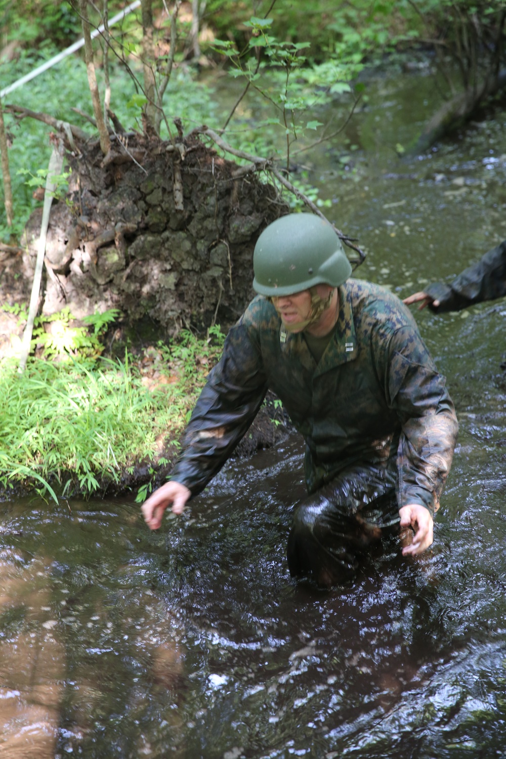 Cookin’ up mud: Food Service Company runs the endurance course