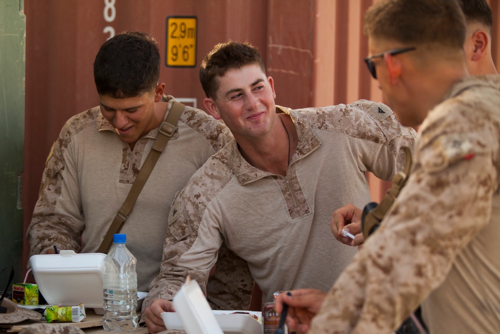 Marines and Afghans celebrate the begining of Ramadan