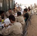 Marines and Afghans celebrate the begining of Ramadan