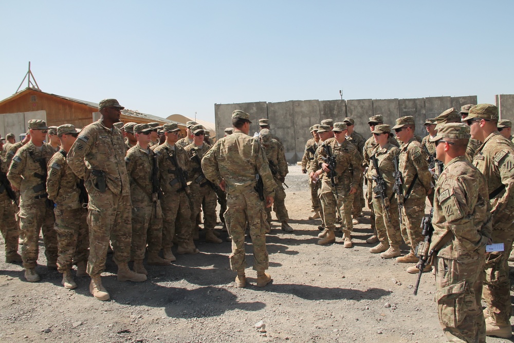 ‘Mustang’ soldiers awarded combat badges