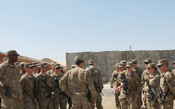 ‘Mustang’ soldiers awarded combat badges