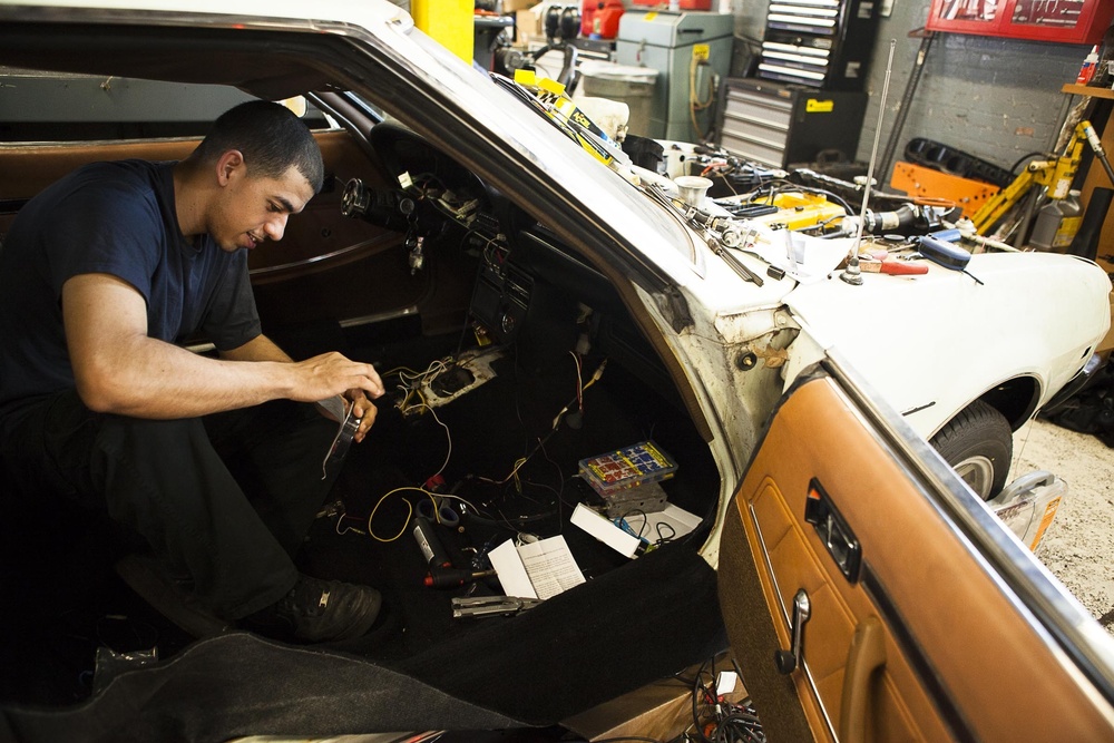 Twenty-seven year old works at restoring 38-year-old car