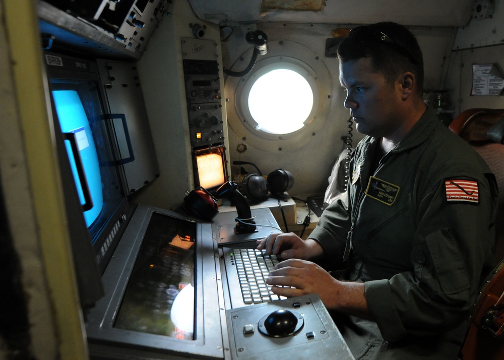 Naval aircrewman performs preflight inspection