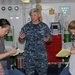 Sailor talks during Hollywood to the Navy tour