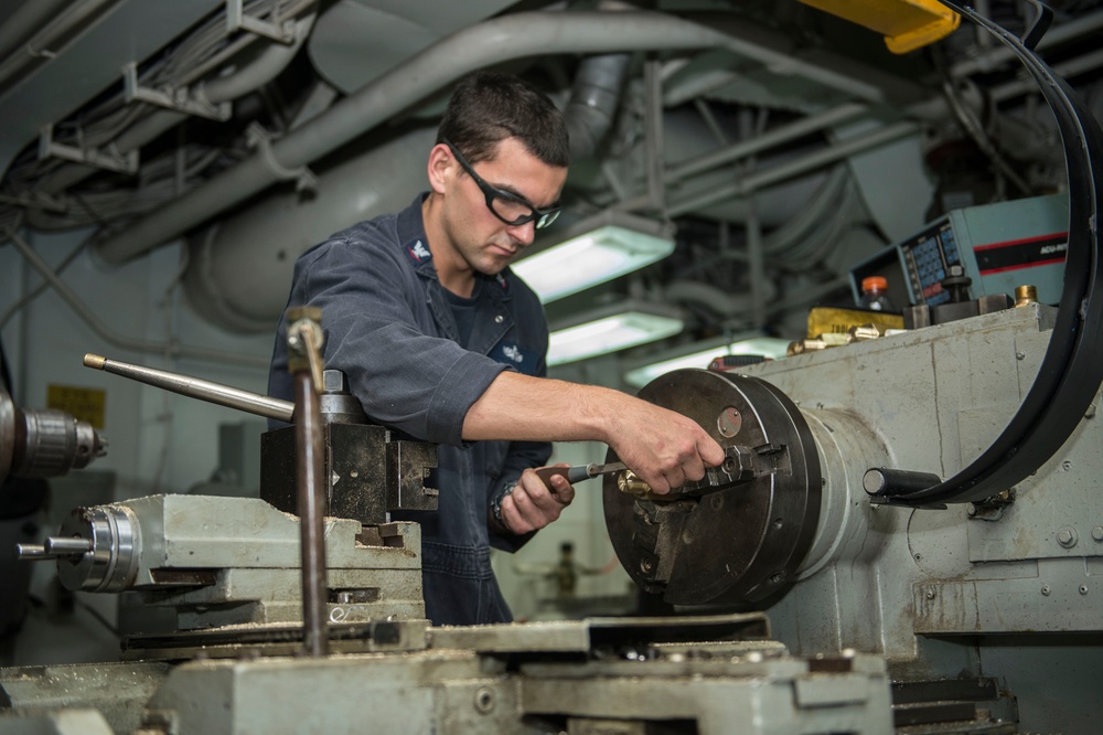 USS Boxer sailor at work