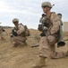 Recon Marines seize enemy objective during raid exercise