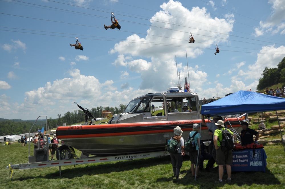 Scouts zip line over Coast Guard boat at National Jamboree