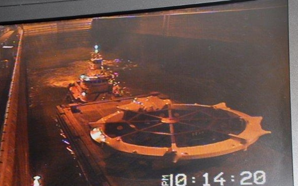 Electromagnetic particle ring passes through Kentucky Lock on circuitous journey