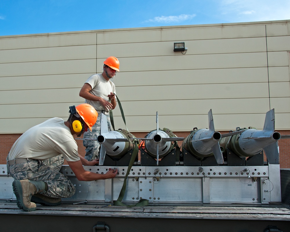 363rd Training Squadron places inert MK 82 LD munitions onto 40-foot rail set