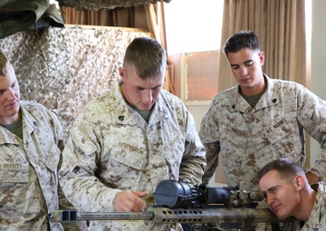 Light armored reconnaissance Marine trains with .50 cal sniper rifle