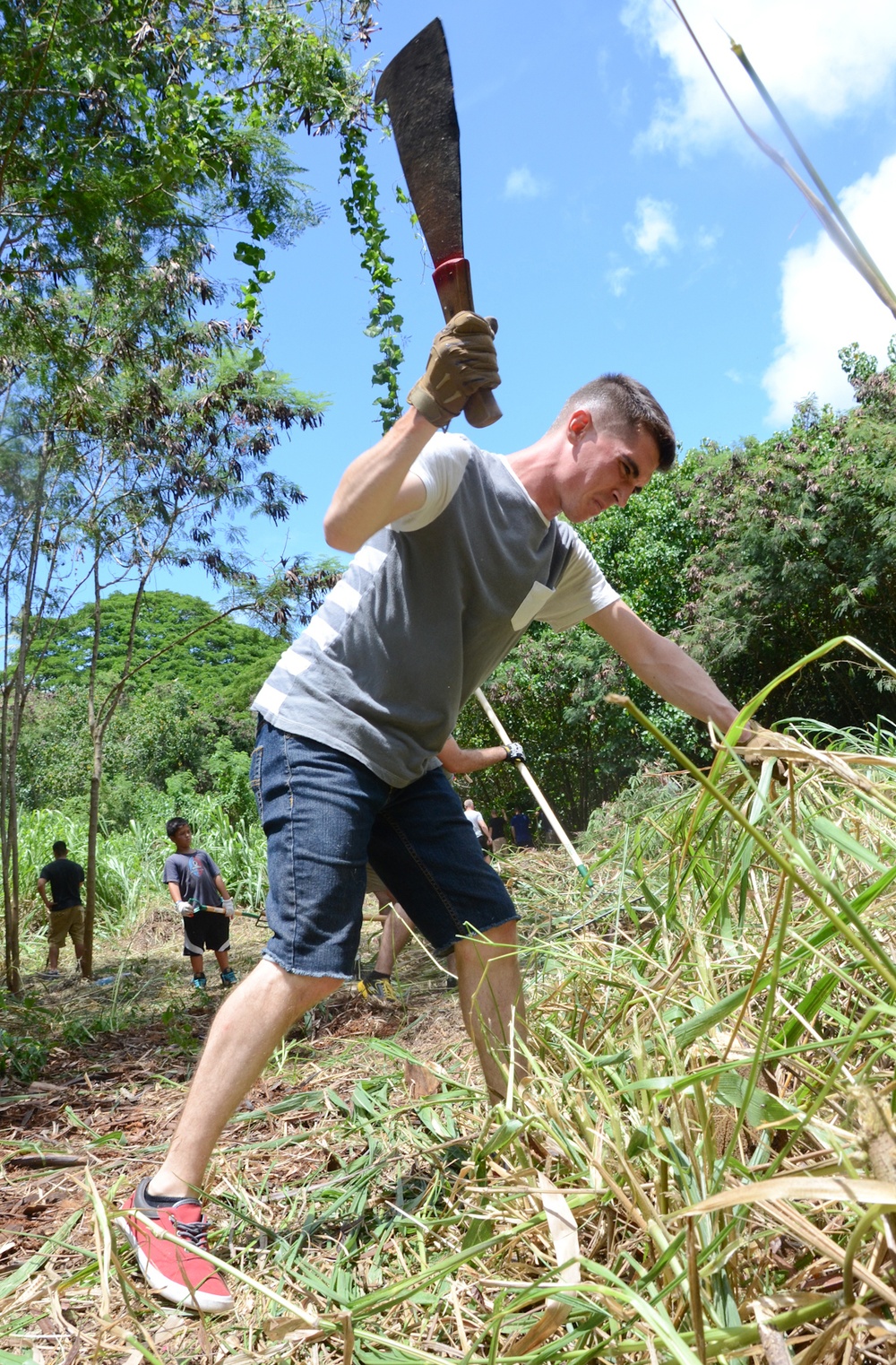 'Island Warriors,’ family members volunteer to clear vegetation