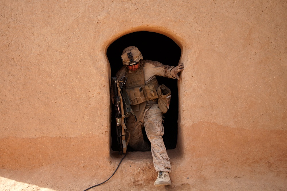 U.S. Marines with Fox Co., 2/2, conduct counter insurgency operations in Helmand province