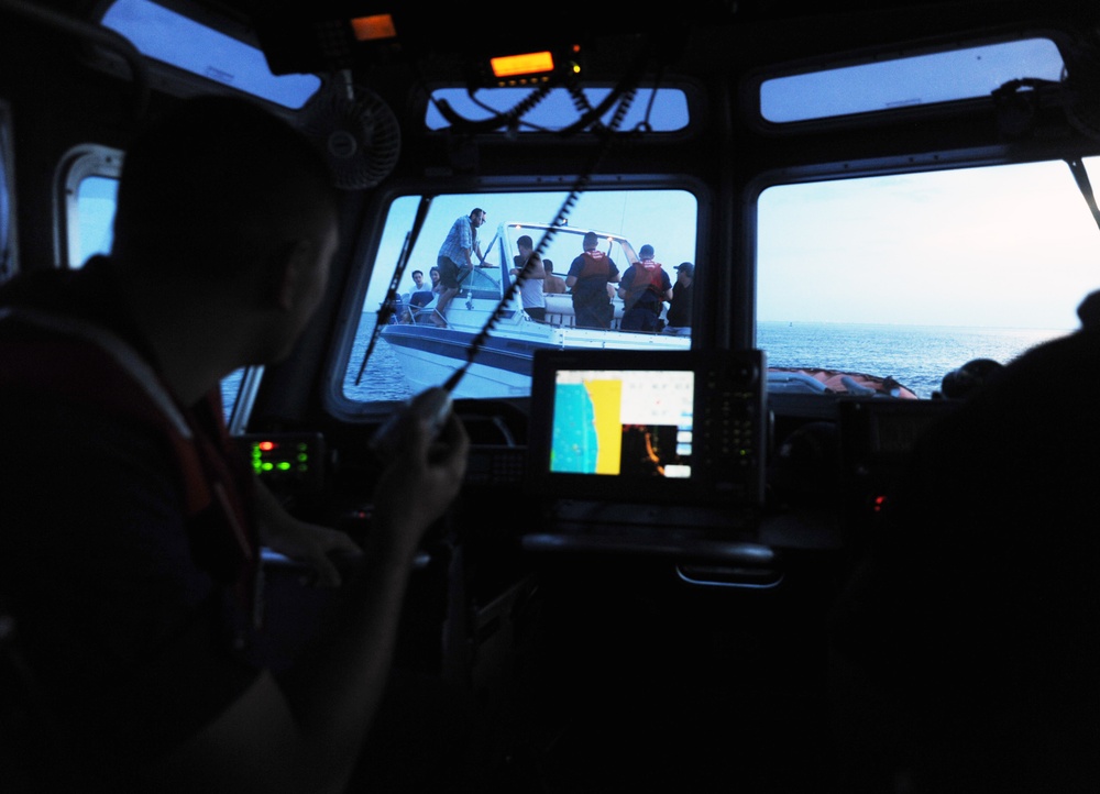 Coast Guard Station Fire Island boarding team members conduct safety inspections