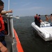 Coast Guard Station Fire Island boarding team members conduct safety inspections