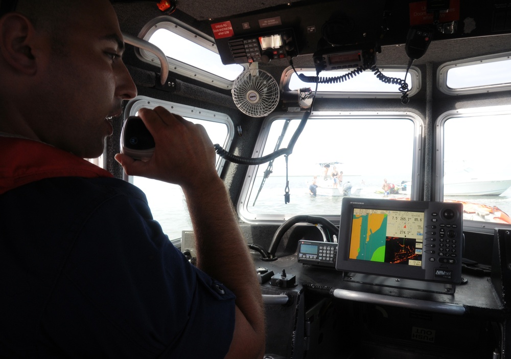 Coast Guard Station Fire Island boarding team members conduct safety inspections