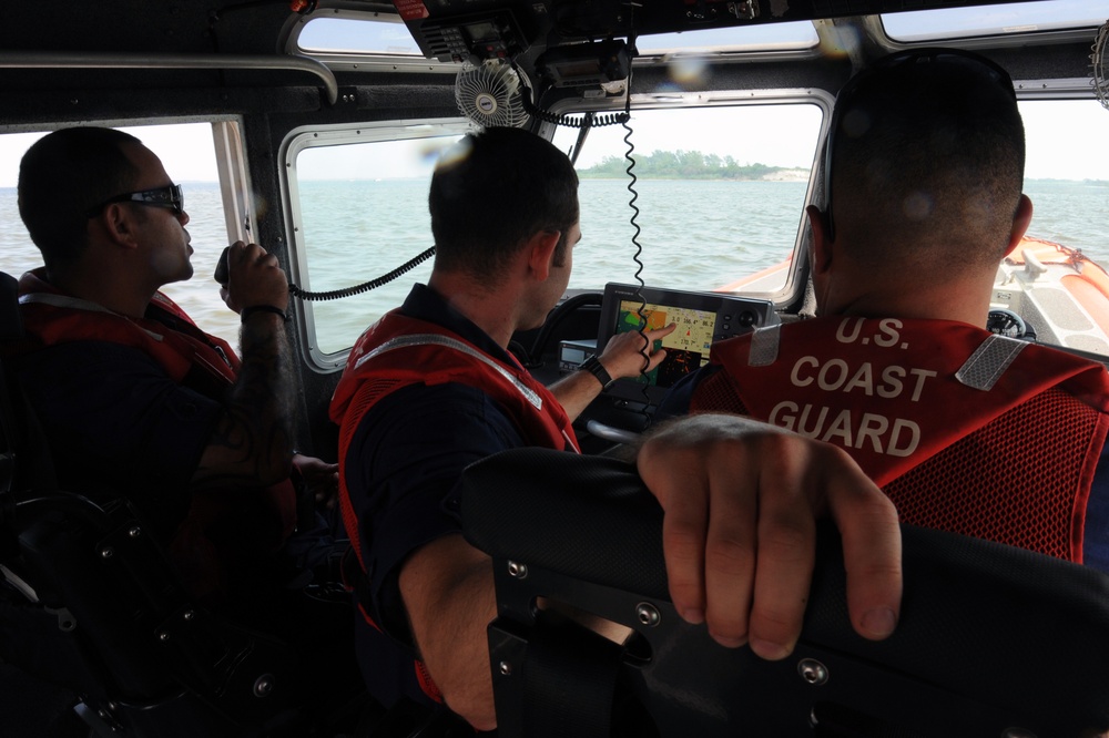 Coast Guard Station Fire Island boarding team members conduct safety inspections