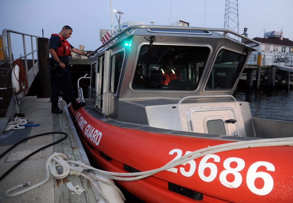 Coast Guard Station Fire Island boarding team members conduct safety inspections