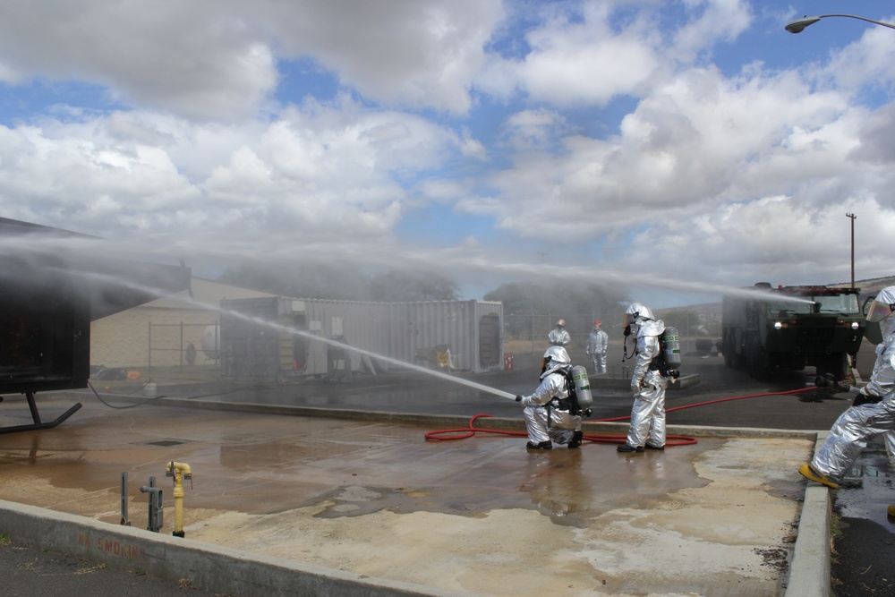Firefighters conduct live fire training