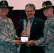 Ironhorse receives the Army Marathon trophy