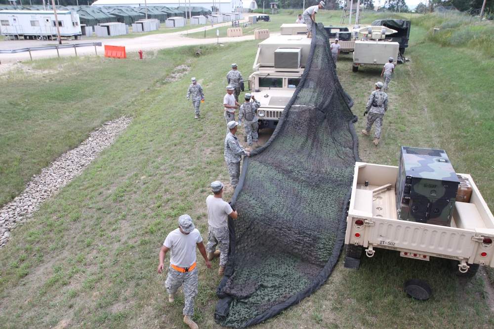 Soldiers of the 829th Signal Company set up their area of operation at 2013 WAREX
