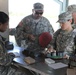Soldiers of the 303rd MEB distribute ammunition for 9 mm range at 2013 WAREX