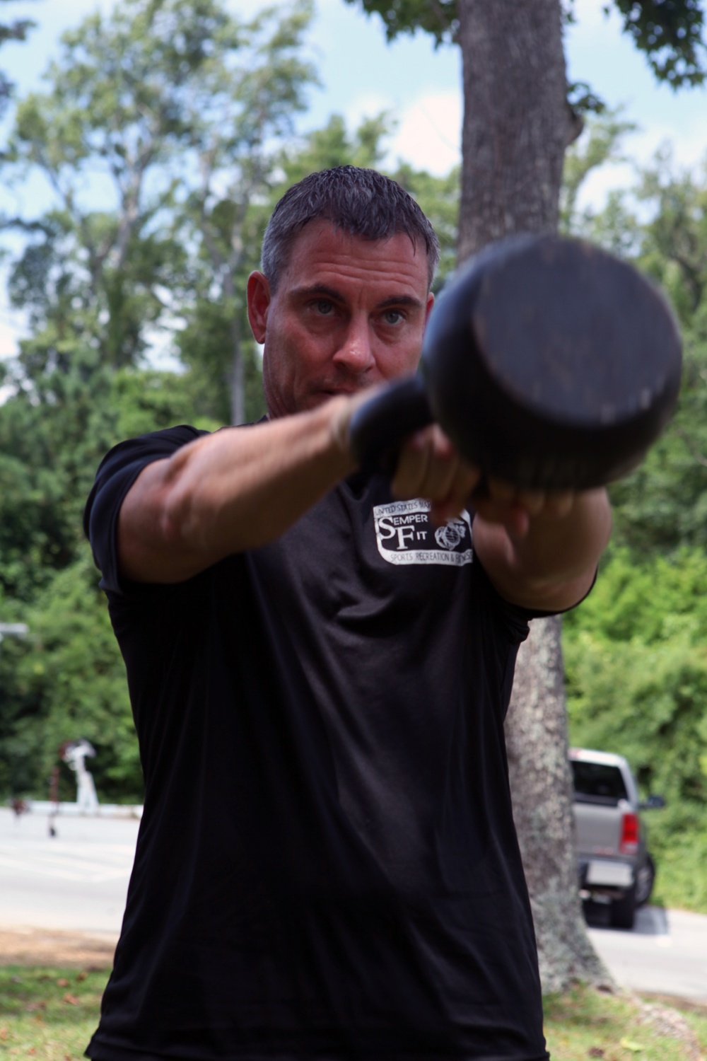 Paddleboard workout pushes physical limits on land, water