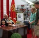 Colin Powell signs books at JBM-HH Marine Exchange