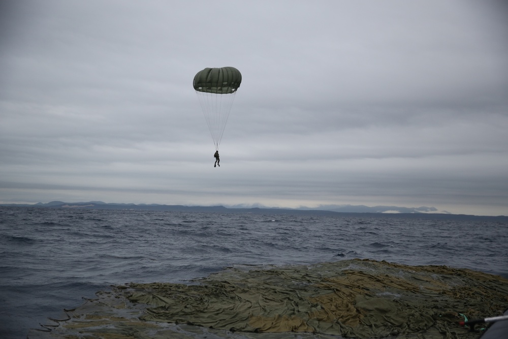 US Marines parachute into Coral Sea