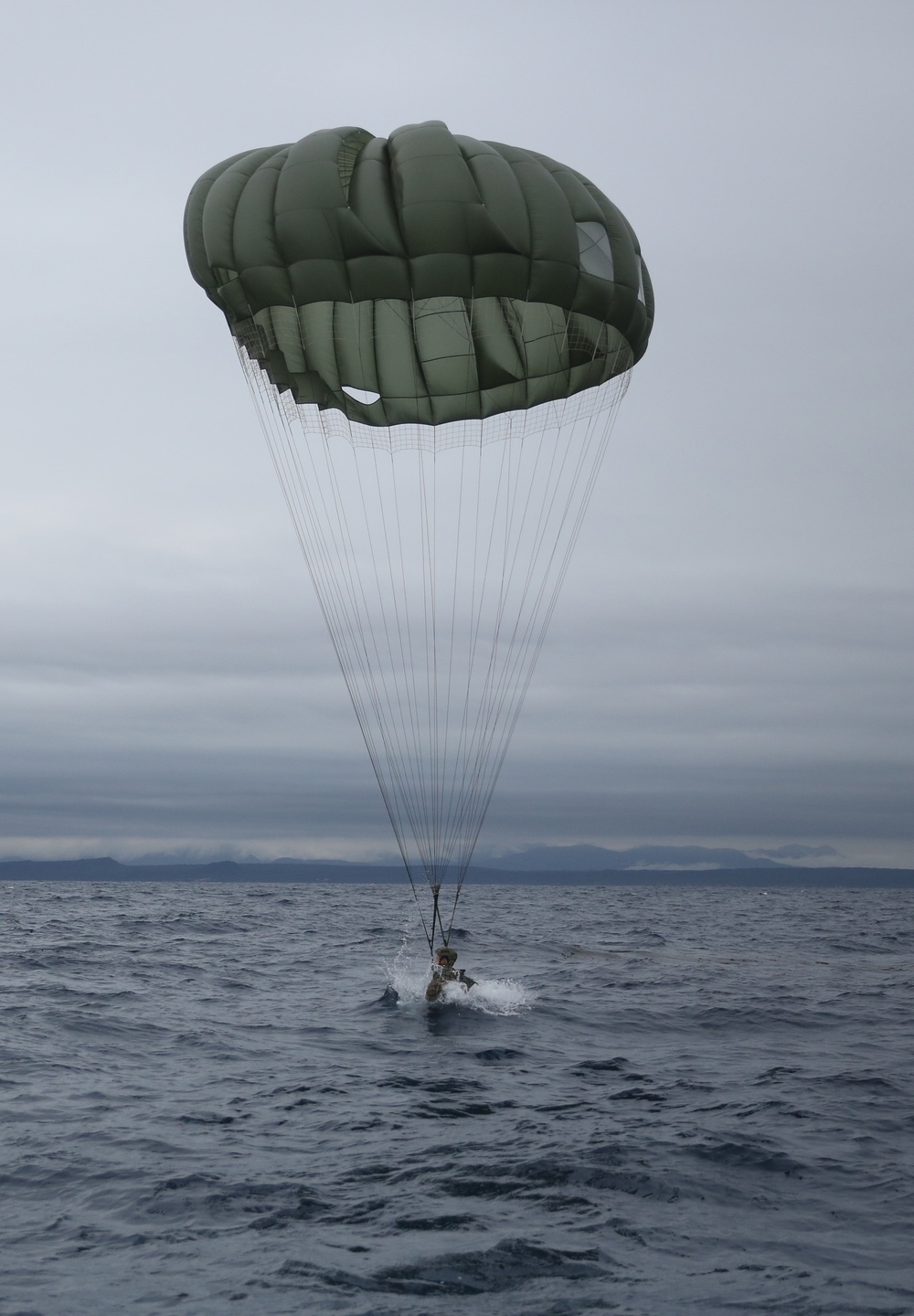 US Marines parachute into Coral Sea