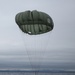 US Marines parachute into Coral Sea