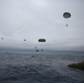US Marines parachute into Coral Sea